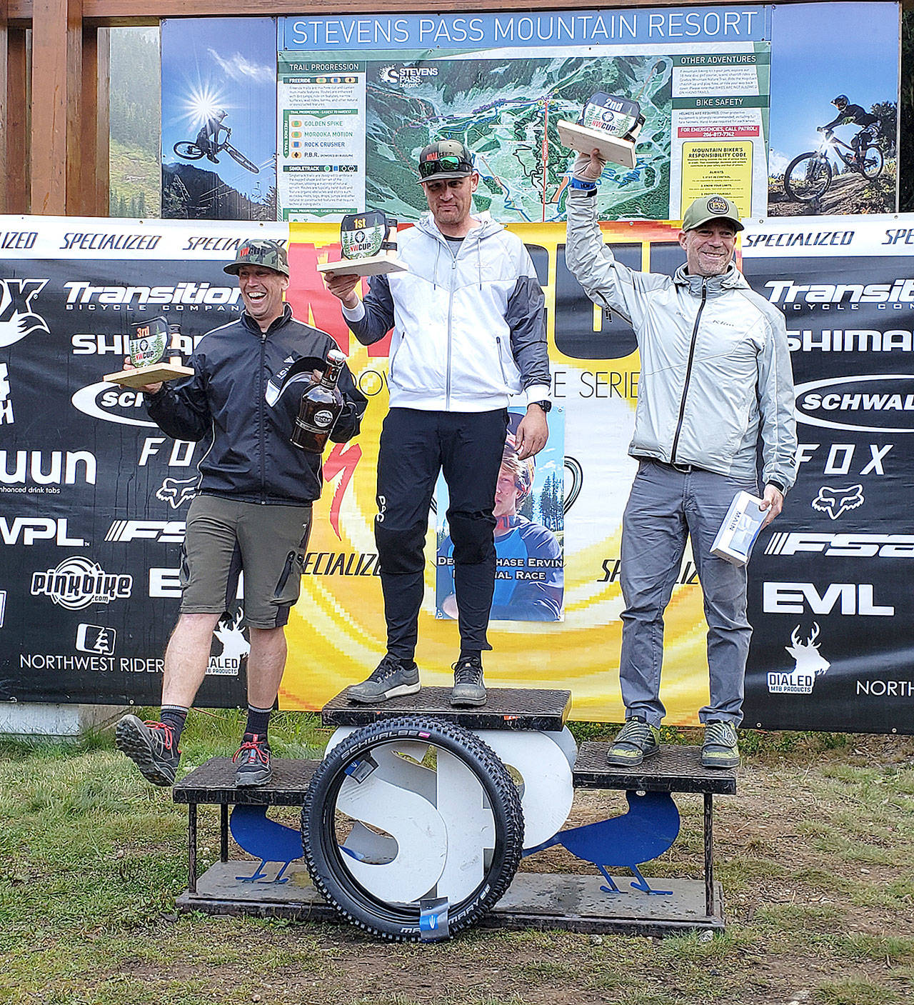 Travis Bear of Sequim, center, won the Northwest Cup championship for the men’s Cat 3 40-59 division. Bear had seven top 3 finishes in NW Cup races this spring and summer, dominating his division.