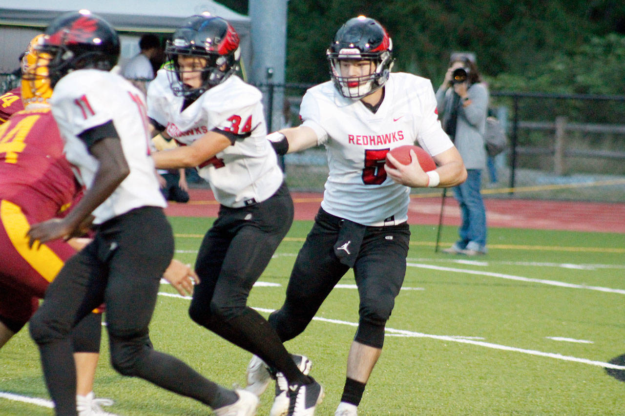 Mark Krulish/Kitsap Daily News Noa Apker-Montoya runs with the ball during a game against Kingston that was eventually canceled by lightning strikes. Port Townsend trailed Kingston 20-0 but was at the Bucs 1-yard line when the game was halted in the middle of the second quarter. Mark Krulish/Kitsap Daily News Noa Apker-Montoya runs with the ball during a game against Kingston that was eventually canceled by lightning strikes. Port Townsend trailed Kingston 20-0 but was at the Bucs 1-yard line when the game was halted in the middle of the second quarter.