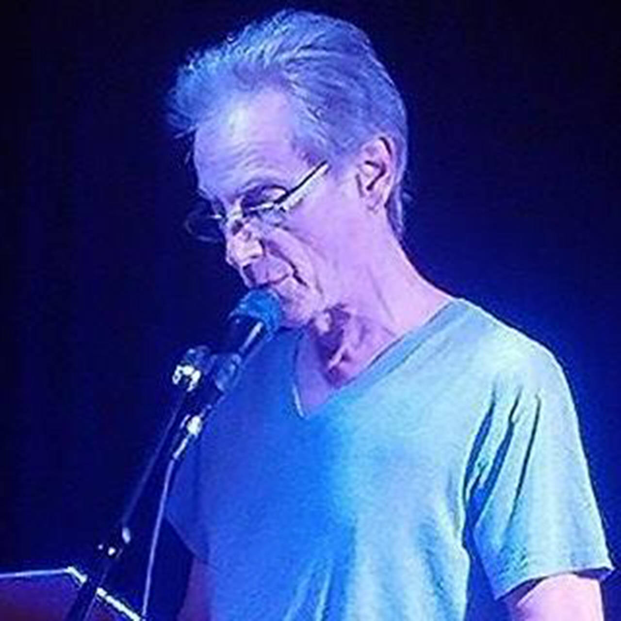 Dan DePrez performing a reading at a stage show he put on in Portland, Ore., in August 2017.