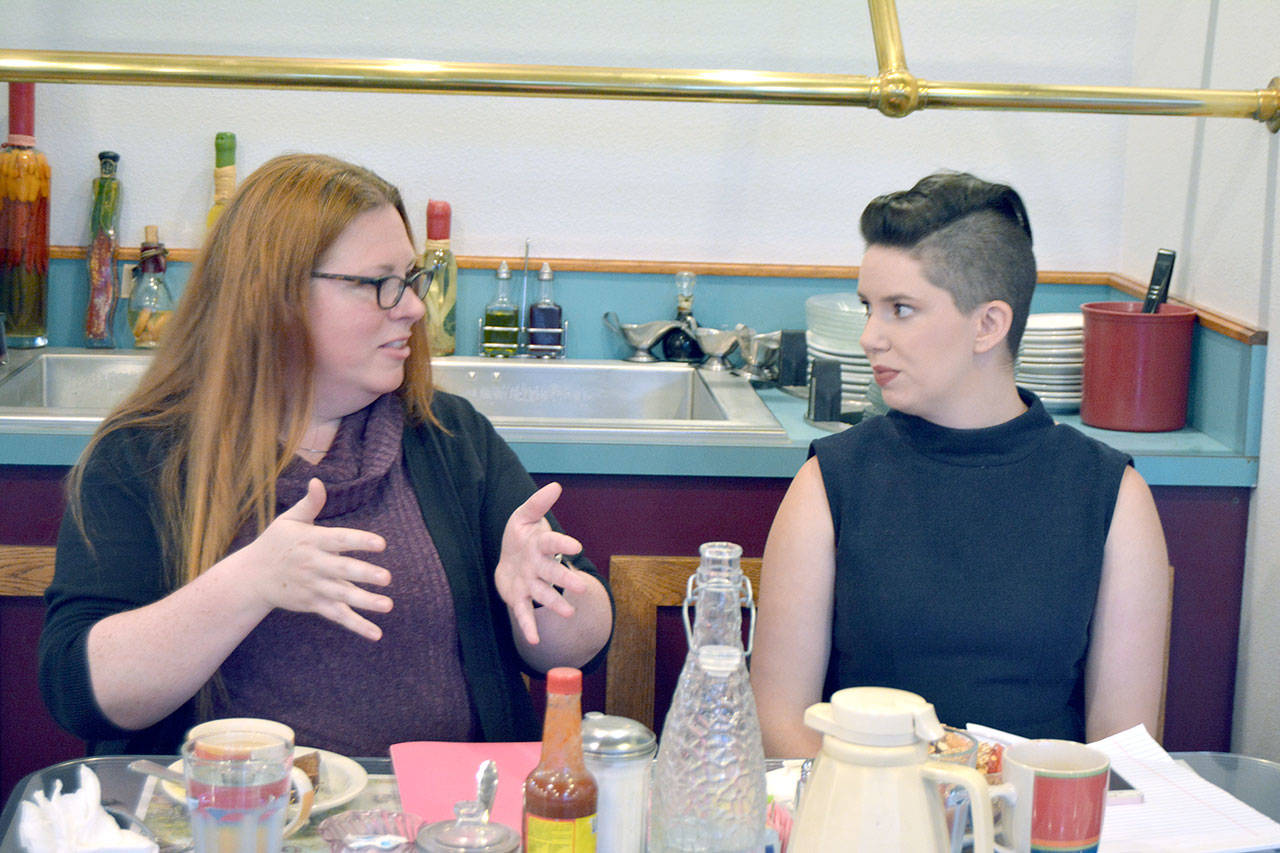 Port Angeles City Council candidates Nina Napiontek, left, and Navarra Carr chatted Tuesday morning before their voters forum. (Paul Gottlieb/Peninsula Daily News)