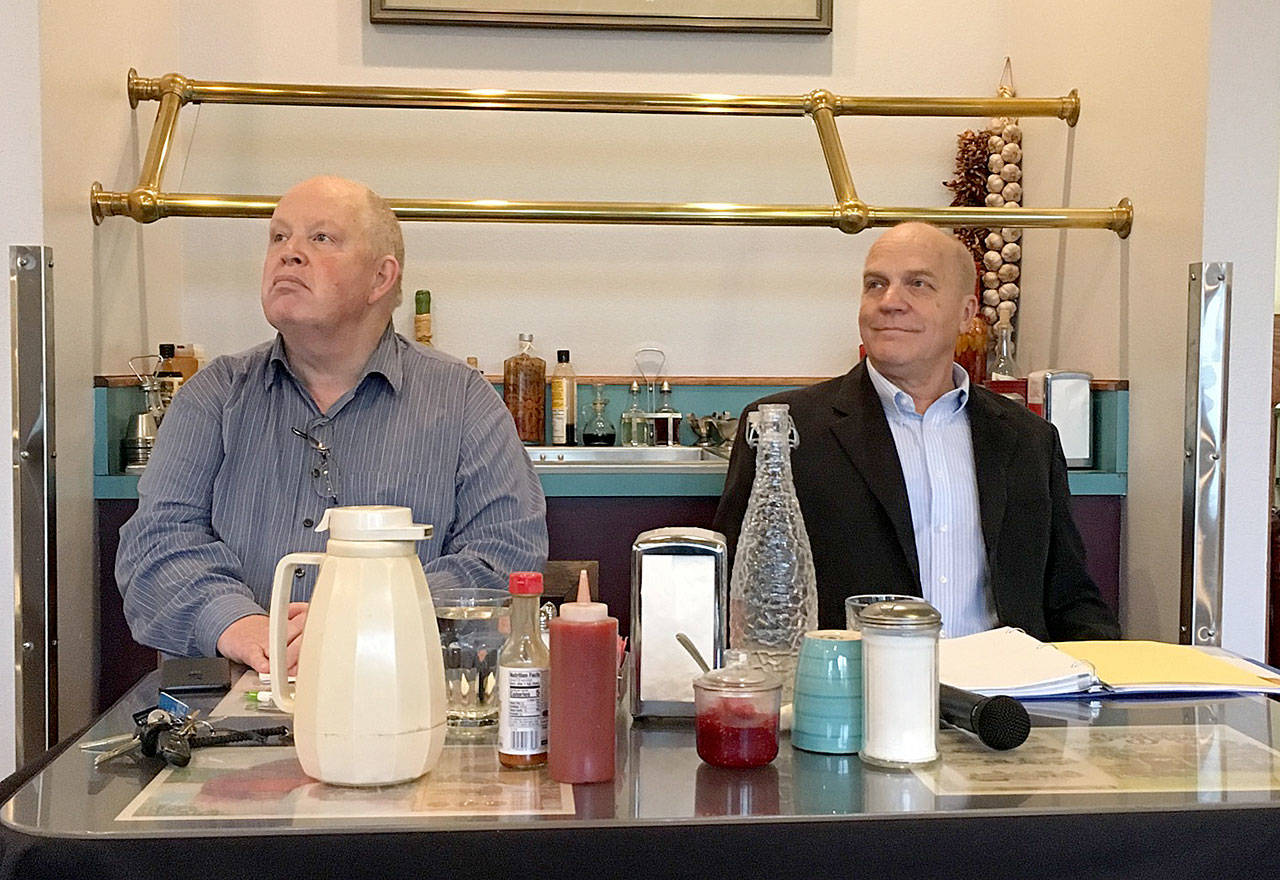 Doc Robinson, left, and Charlie McCaughan prepare to debate in a Port Angeles Business Association forum Tuesday morning at Joshua’s Restaurant. (Rob Ollikainen/Peninsula Daily News)