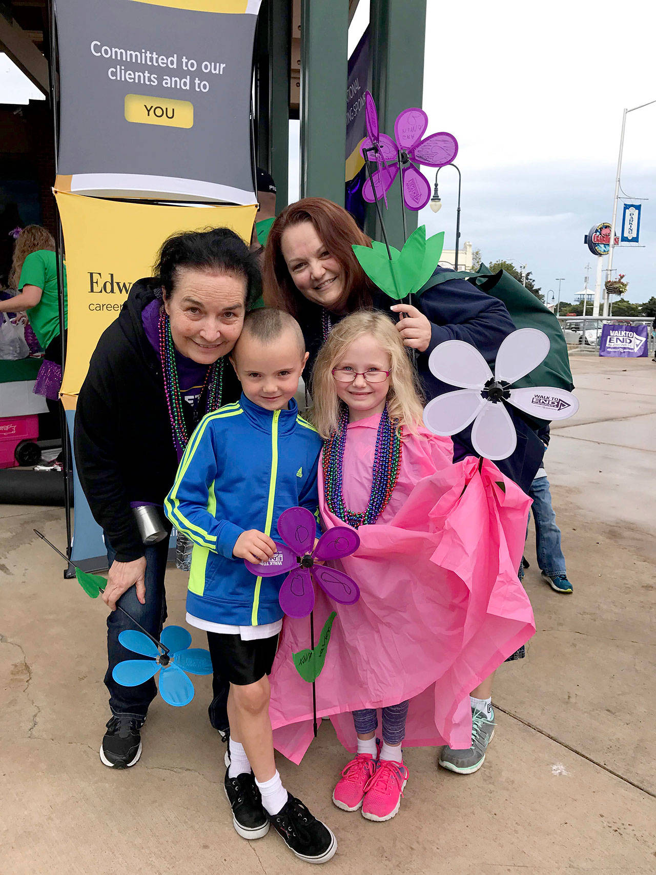 Michele Devlin of Sequim, pictured here with her mother Debi Turner and her twin children, will be participating in the North Olympic Peninsula Walk to End Alzheimer’s for the third year in a row. She walks in honor of her mom, Debi Turner, who lost her battle with Alzheimer’s disease and breast cancer in December 2018. (Submitted photo)