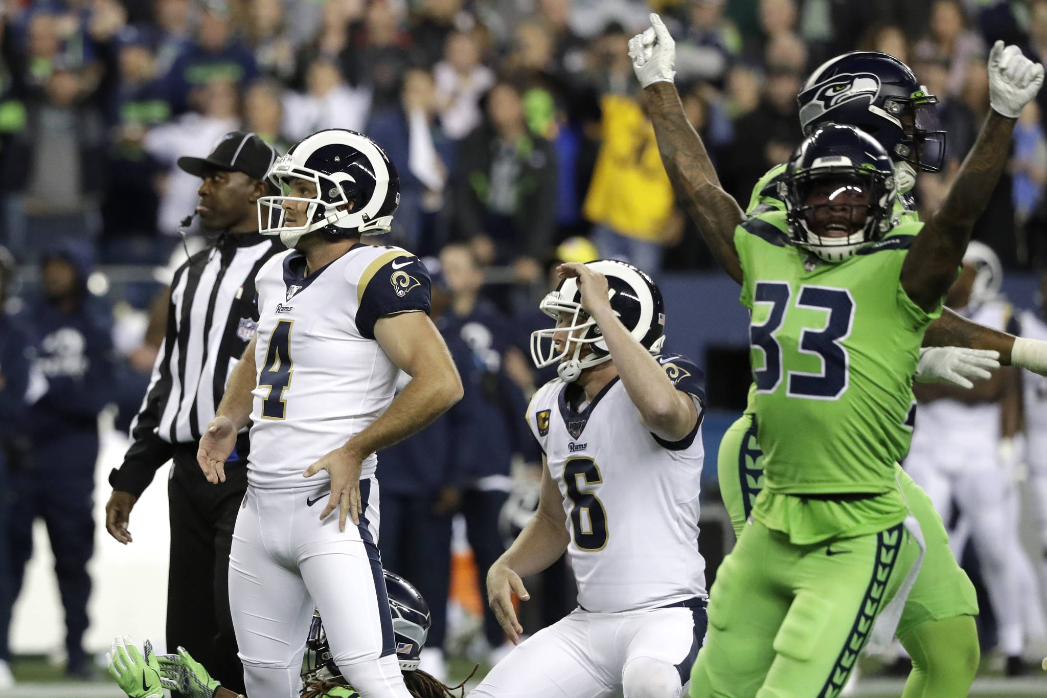 SEAHAWKS: By a whisker — Seattle wins when Rams’ kick goes inches wide
