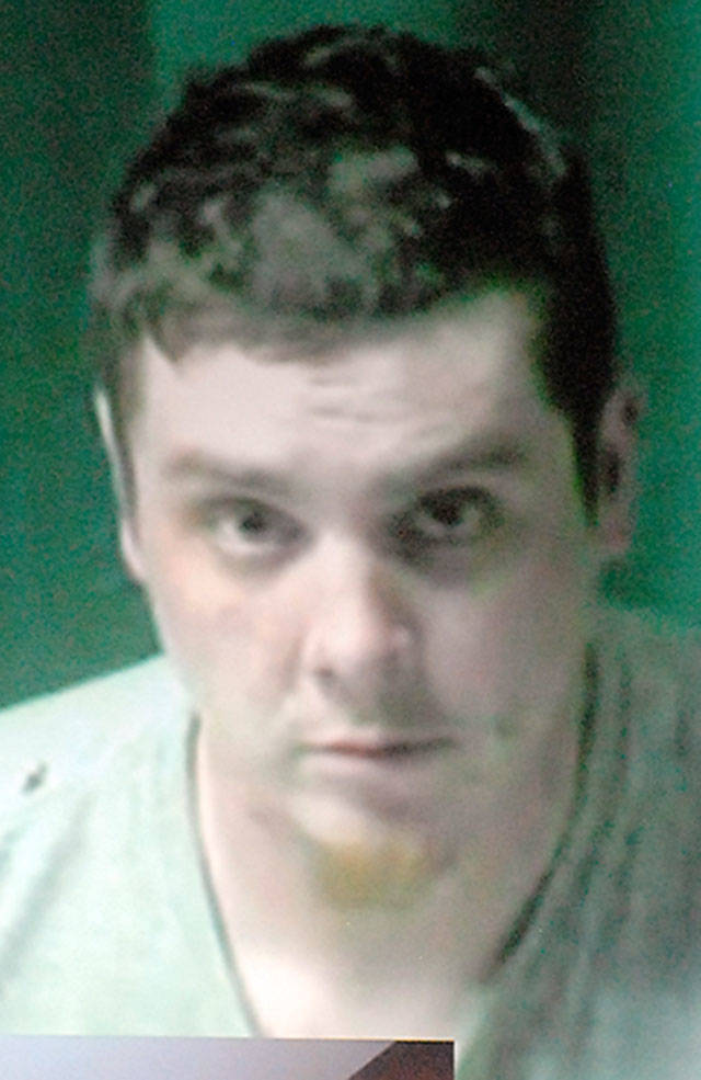 Jason Hutt appears by video link during his first appearance in Clallam County Superior Court. (Keith Thorpe/Peninsula Daily News)