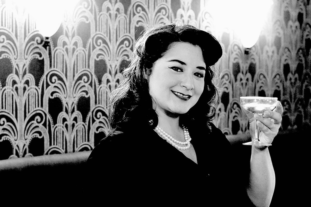 Key City Public Theatre’s Christa Holbrook raises her glass at The In Between, the Port Townsend venue for “The Art of Cocktails and Mocktails” this Wednesday. (Diane Urbani de la Paz/for Peninsula Daily News)