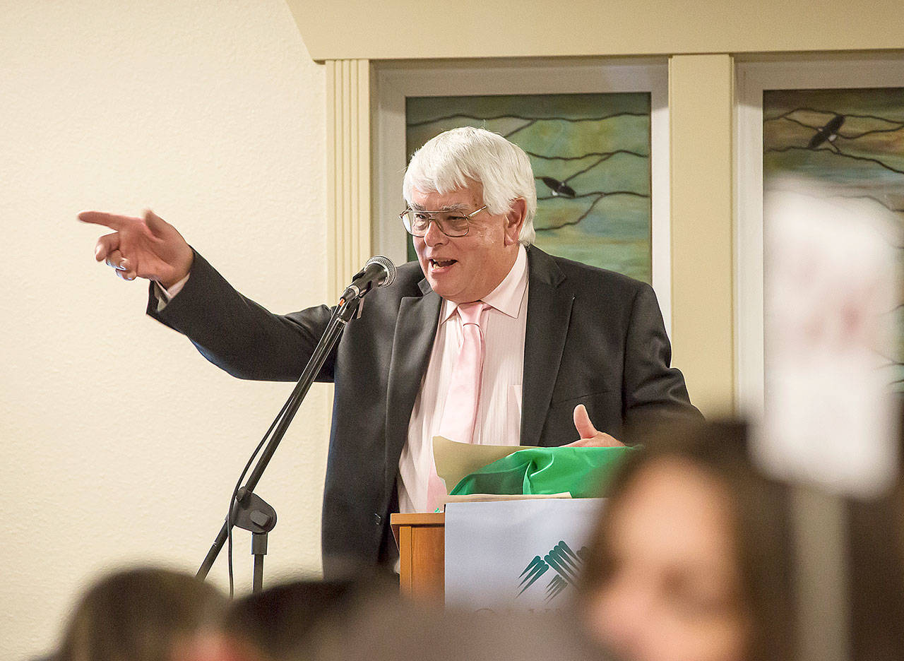 Mike Millar, a recent patient at Olympic Medical Center’s Cancer Center in Sequim, speaks at the Harvest of Hope event. (Olympic Medical Center Foundation)