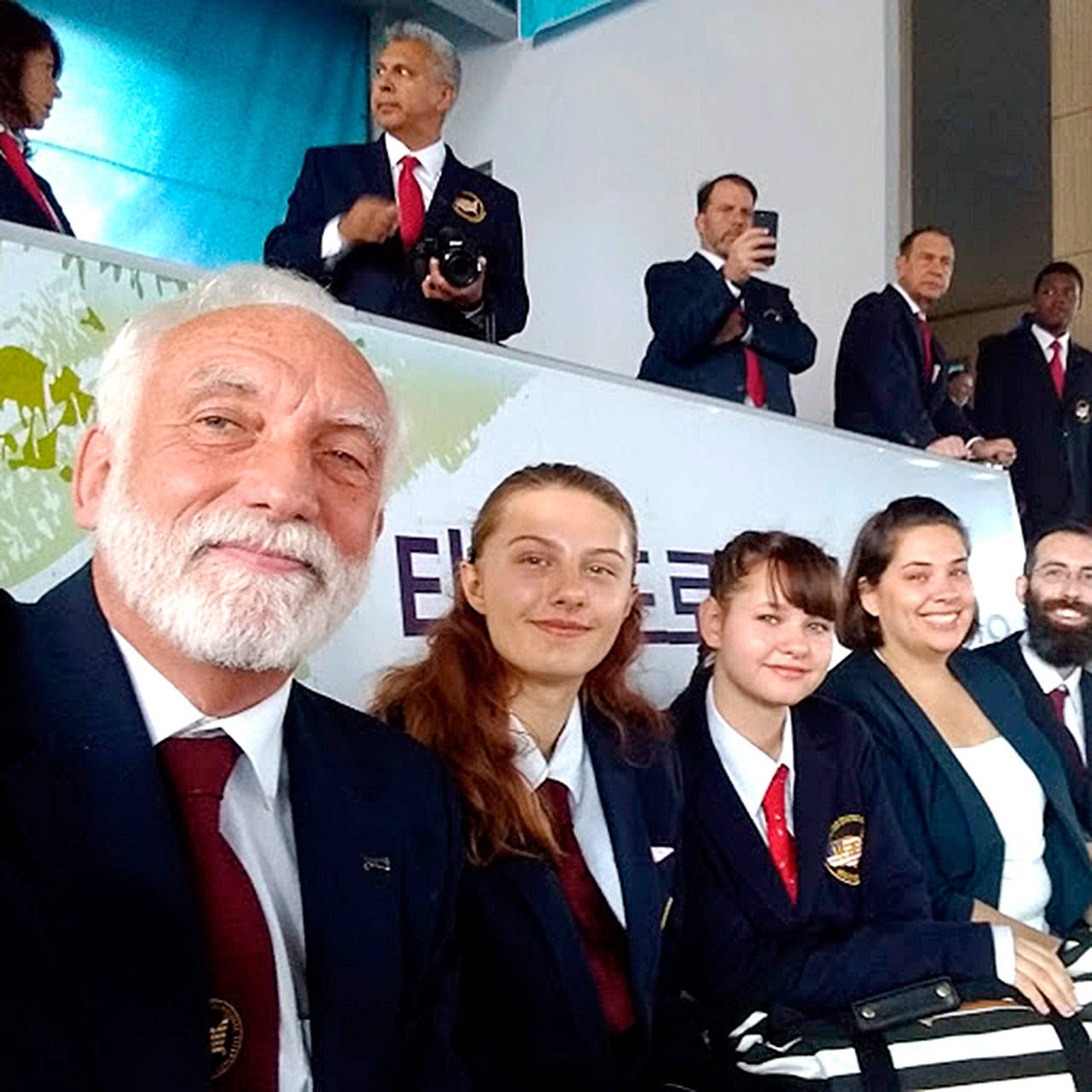 White Crane Grandmaster Robert Nicholls, left, visited the Taekwondo World Headquarters in Korea along with students Scarlett Fulton of Port Angeles and Ava Reymond of Sequim. At far right is White Crane instructor Robert Nicholls Jr.