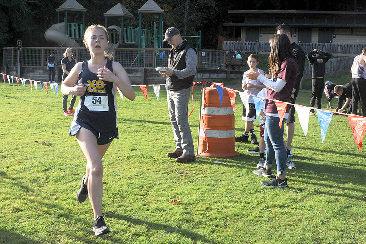 CROSS COUNTRY: Forks’ Archibald races to Evergreen League title