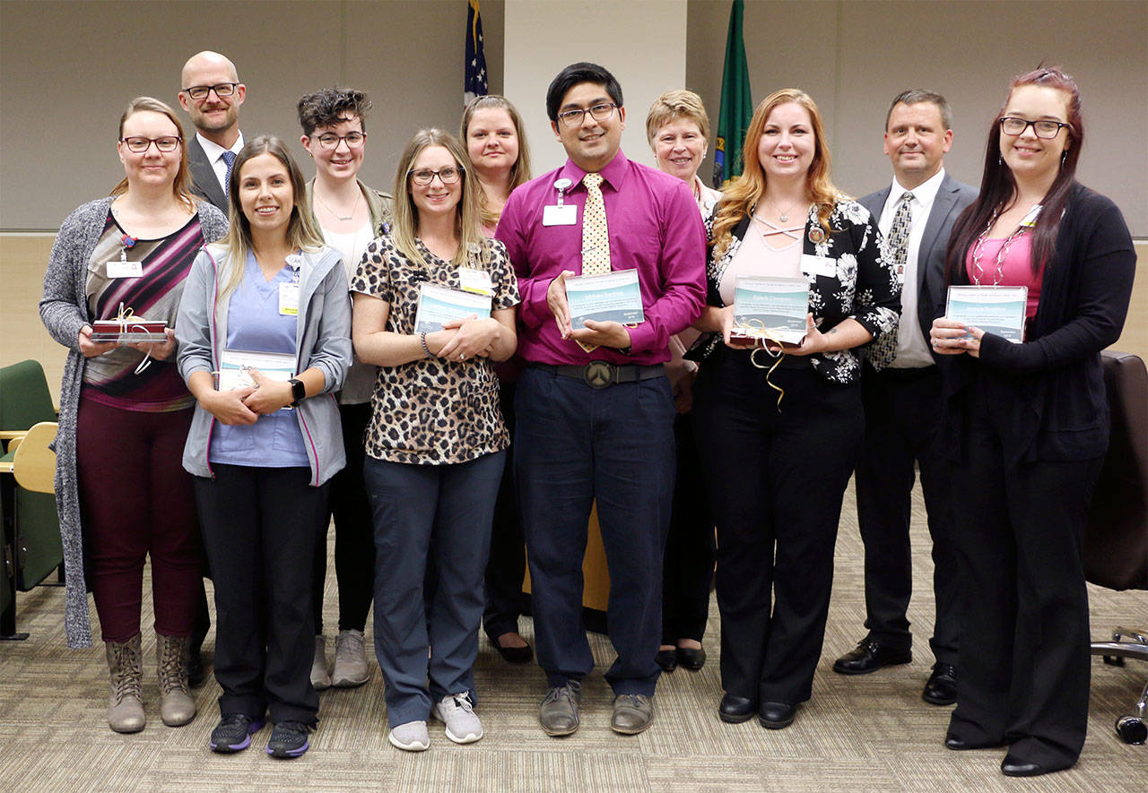 From left, Dawn O’Neill, Dr. Joshua Jones, Samantha Nolan, Janessa Fodge, Lindsay Hopper, Denise Helms, Michael Santoyo, chief operating officer Lorraine Wall, Saavik Cameron, board President John Nutter and Jessica Bustillos. Justine Hanson is not pictured.