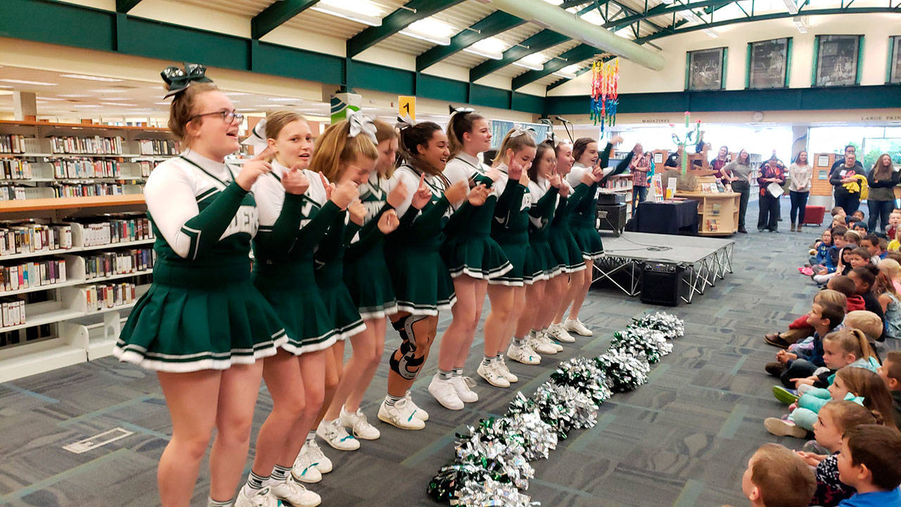 Port Angeles chearleaders welcome at library