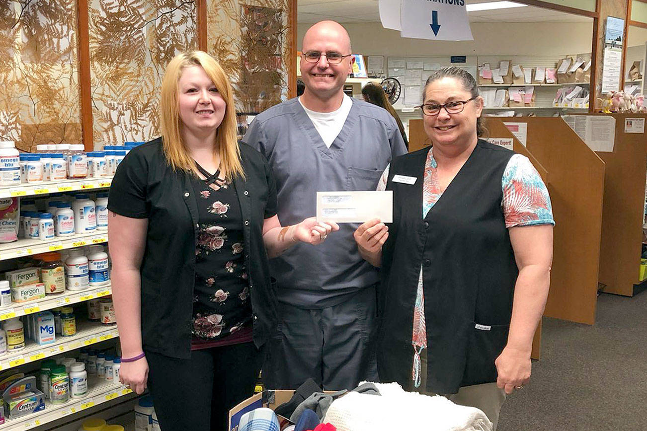 Jim’s Pharmacy donates funds to Olympic Peninsula Community Clinic
