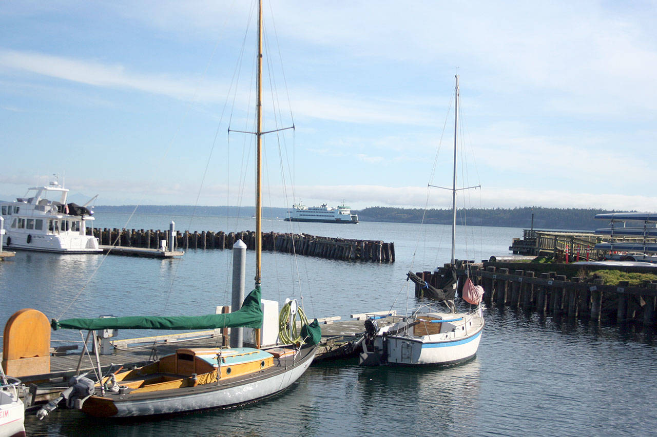 A state ferry passes by Point Hudson on Wednesday. Preliminary election results show the Port of Port Townsend’s Industrial Development District levy passing with an approval rate of nearly 53 percent. Point Hudson is among the sites, which also include the Herb Beck Marina in Quilcene, that would benefit from the $15 million levy. (Brian McLean/Peninsula Daily News)