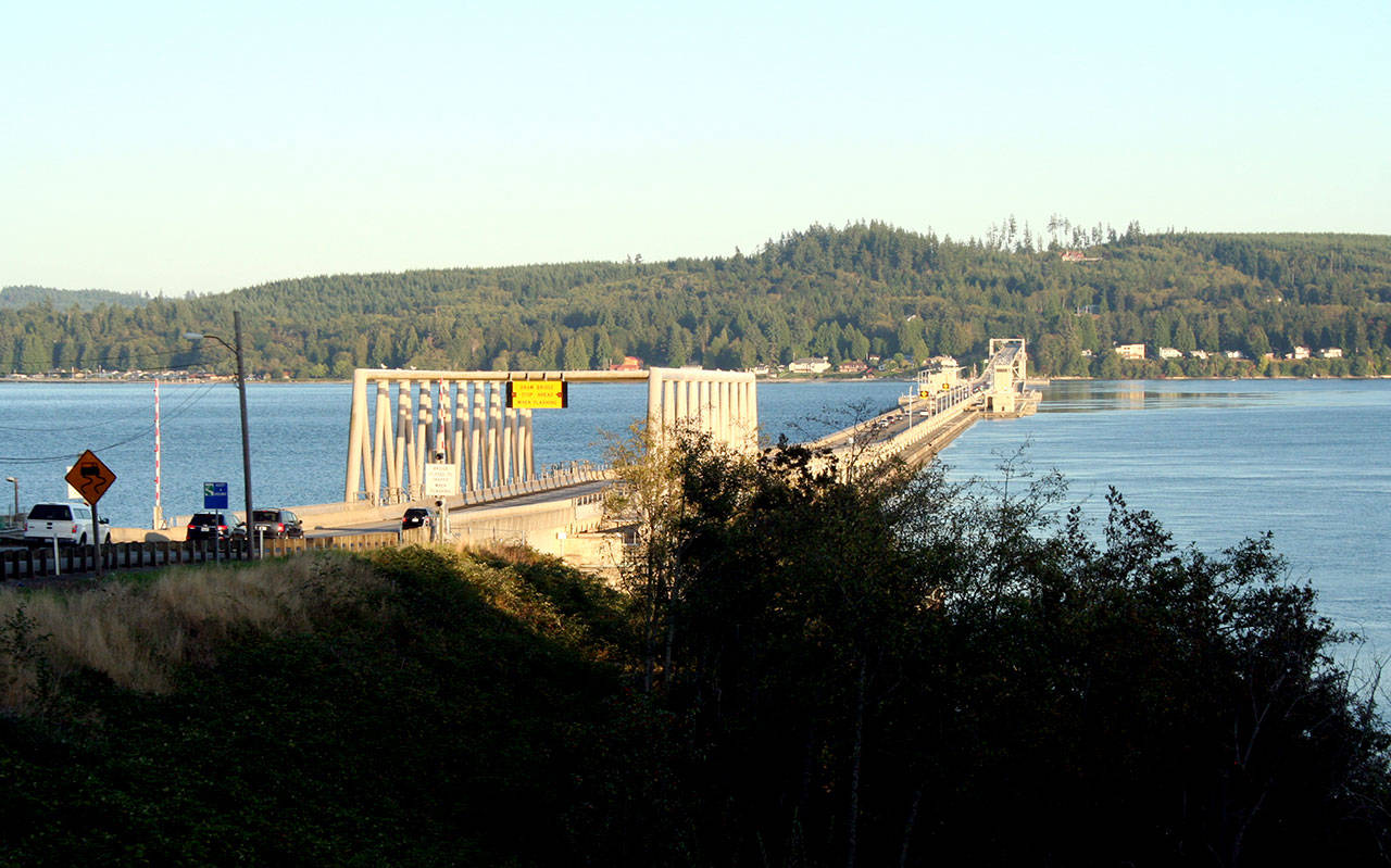 Traffic crosses the Hood Canal Bridge along state Highway 104. (Brian McLean/Peninsula Daily News file)