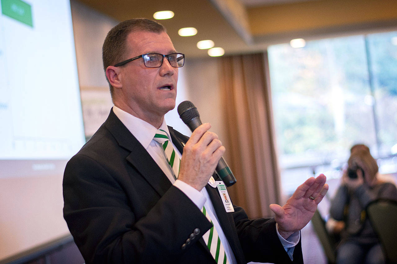 Port Angeles School District Superintendent Martin Brewer presents the district’s plan for a proposed capital levy during the Port Angeles Regional Chamber of Commerce luncheon Wednesday. (Jesse Major/Peninsula Daily News)