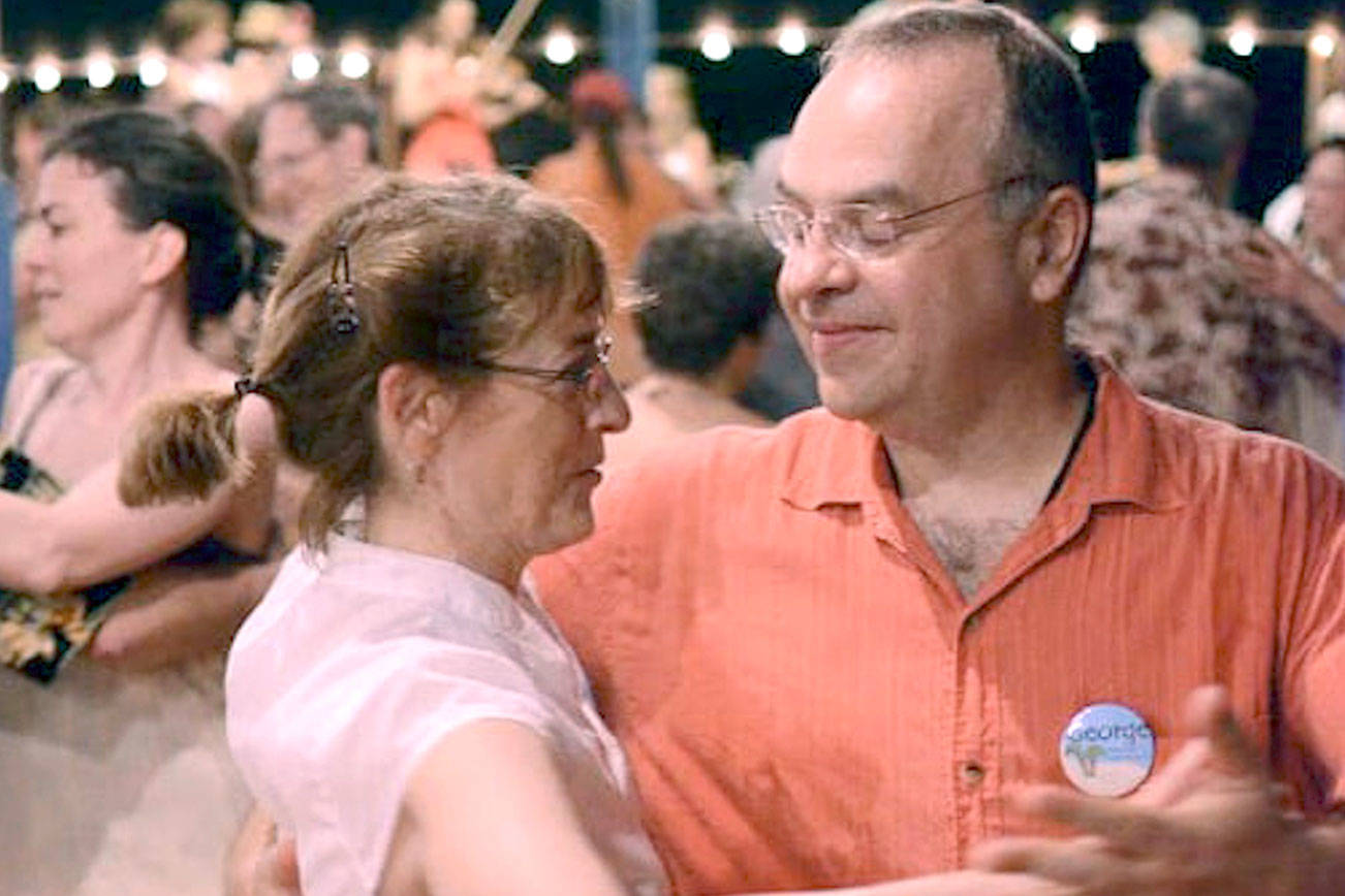 Contra dance caller, band come across country