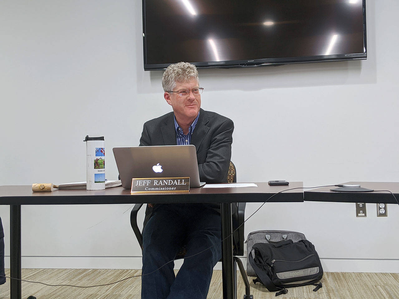 PUD Commission Chair Jeff Randall discusses the PUD’s potential meter opt-out policy during the regular board of commissioners meeting at the Jefferson Transit building. (Zach Jablonski/Peninsula Daily News)