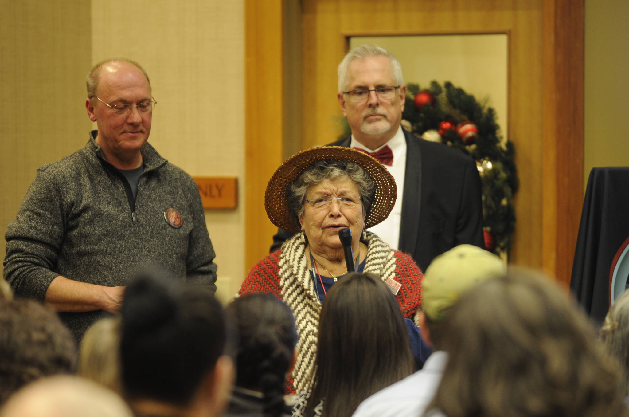 Jamestown S’Klallam Tribe storyteller Elaine Grinnell speaks at the tribe’s MAT clinic design unveiling in Sequim. Behind her are, left, Bud Turner, manager of the Jamestown S’Klallam carving shed and Brent Simcosky, the tribe’s health services director. Michael Dashiell/Olympic Peninsula News Group