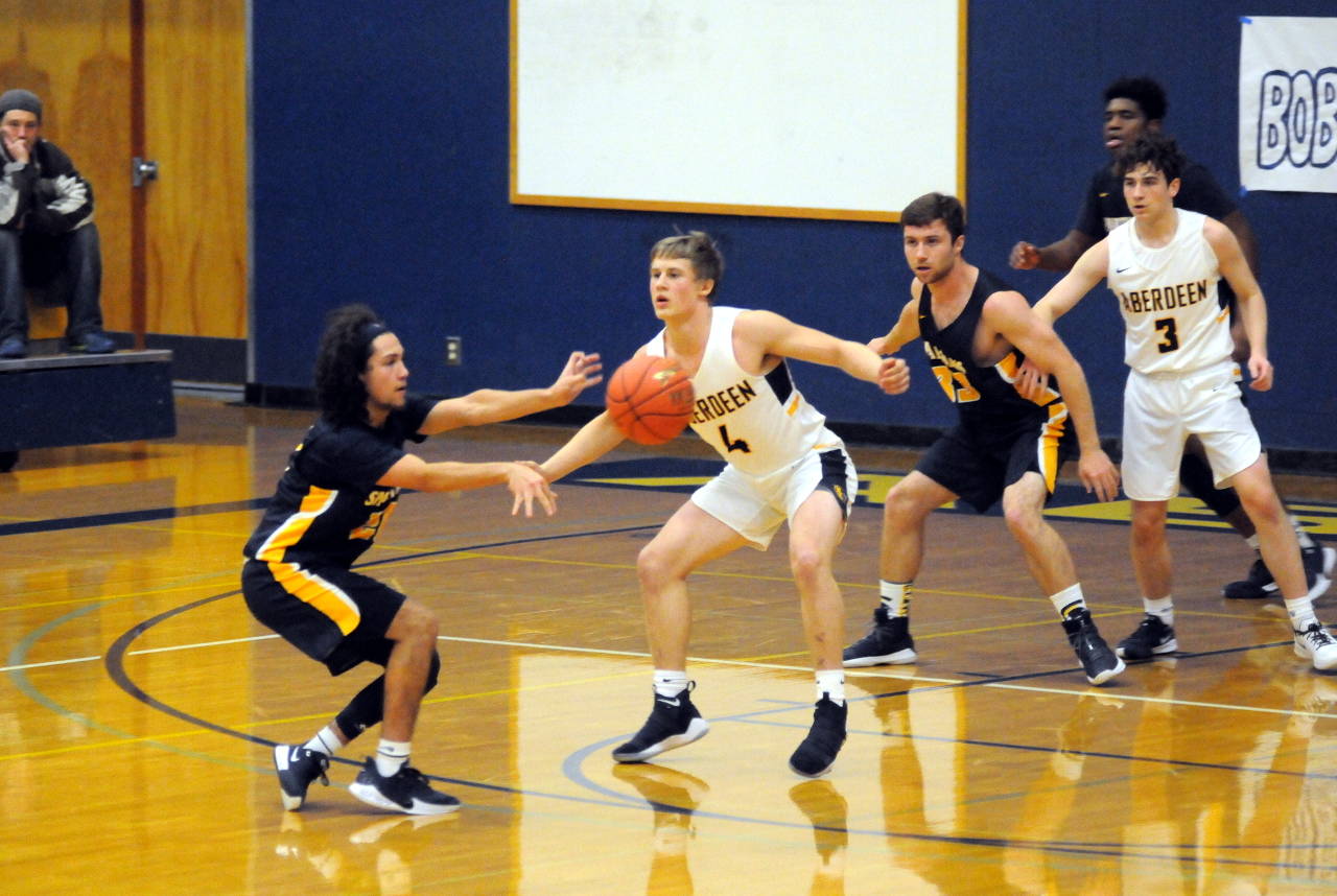 Ryan Sparks/Grays Harbor News Group Forks’ Tony Hernandez-Flores passes the ball during Friday’s game against Aberdeen at Aberdeen High School.