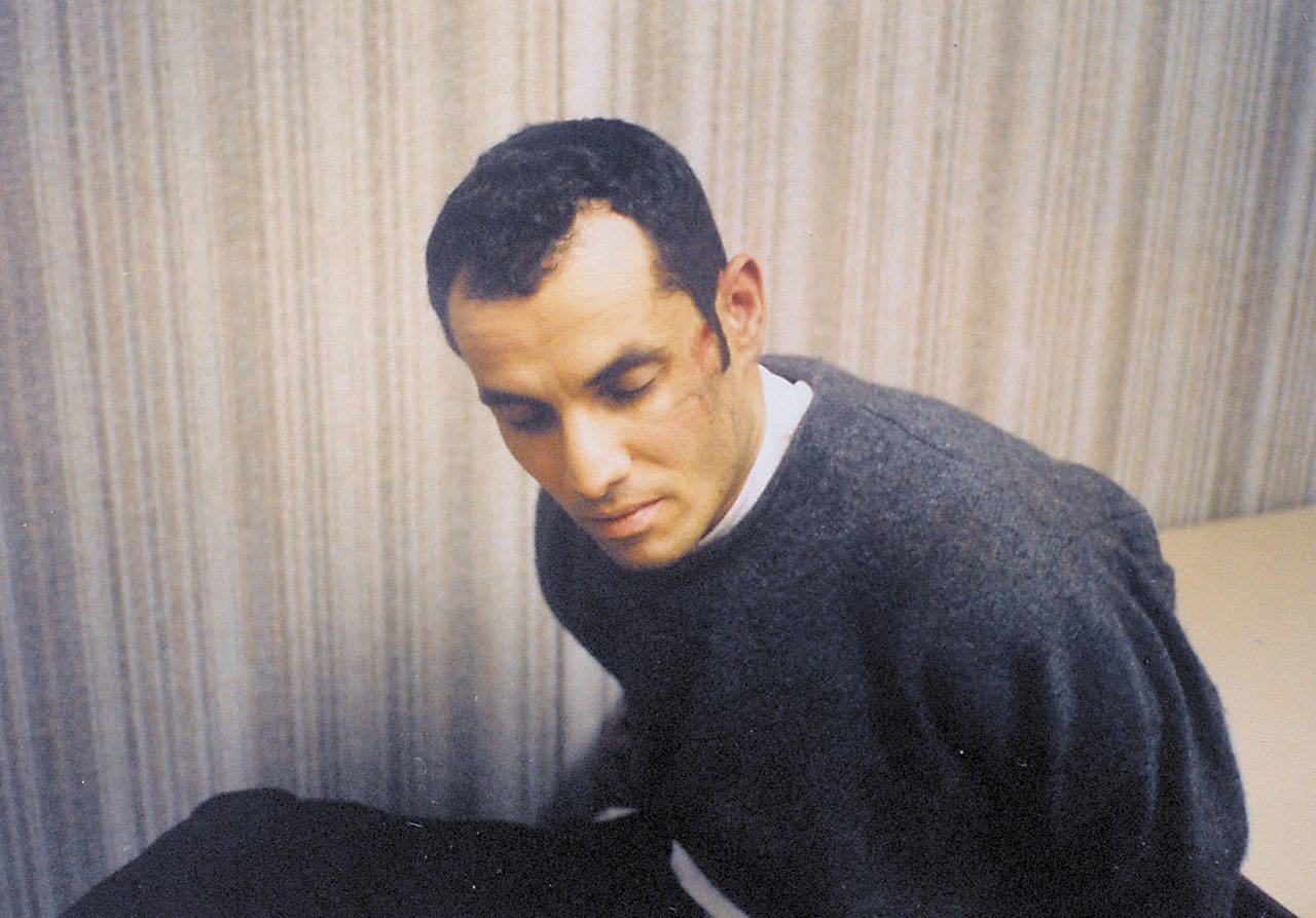 Ahmed Ressam is shown during interrogation on the night he was captured in Port Angeles on Dec. 14, 1999. (U.S. Customs Service, file)