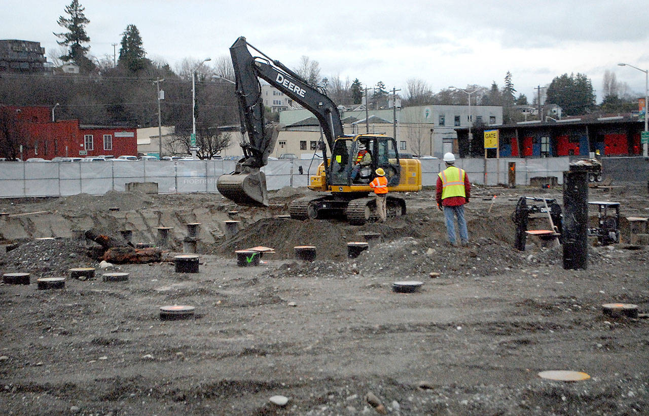 Site preparation continues Thursday for construction of the Field Arts & Events Hall, part of the Port Angeles Waterfront Project. (Keith Thorpe/Peninsula Daily News)