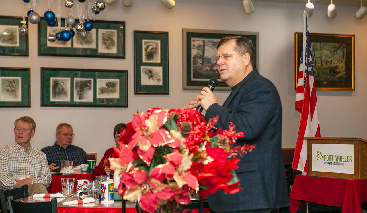 Port Angeles Chamber of Commerce Executive Director Marc Abshire speaks to the Port Angeles Business Association during its weekly meeting at Joshua’s Restaurant. Abshire summarized what the Chamber has accomplished in the past year and what plans they have for the coming year. (Bob Martinson/Peninsula Daily News)