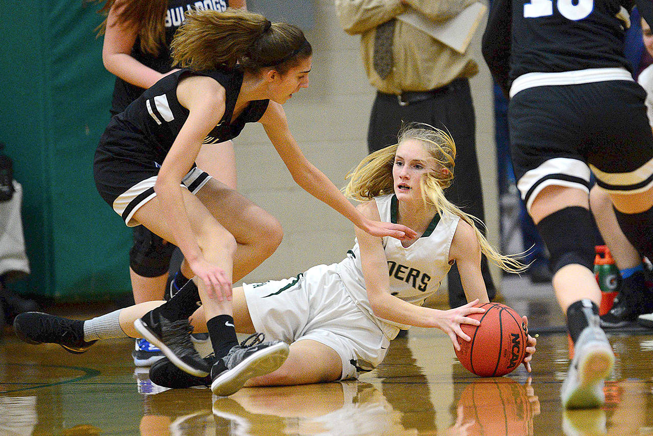 Port Angeles’ Millie Long scrambles for a loose ball in Friday’s game against North Mason. Jesse Major/for Peninsula Daily News