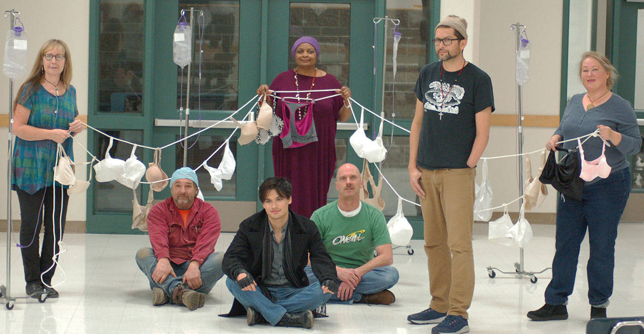 The cast of “Stages” gather during a rehearsal at Sequim Middle School. From left are Jenny Schaper, Jeff Ryser, Ryan Chen, Phyllis Bernard, Dave McInnes, Max Bidasha and Marilyn Kaler. (Conor Dowley/Olympic Peninsula News Group)