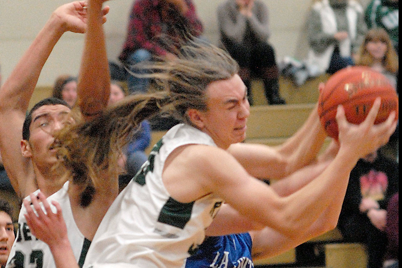 PREP BASKETBALL: Roughriders’ depth, defense too much for La Center
