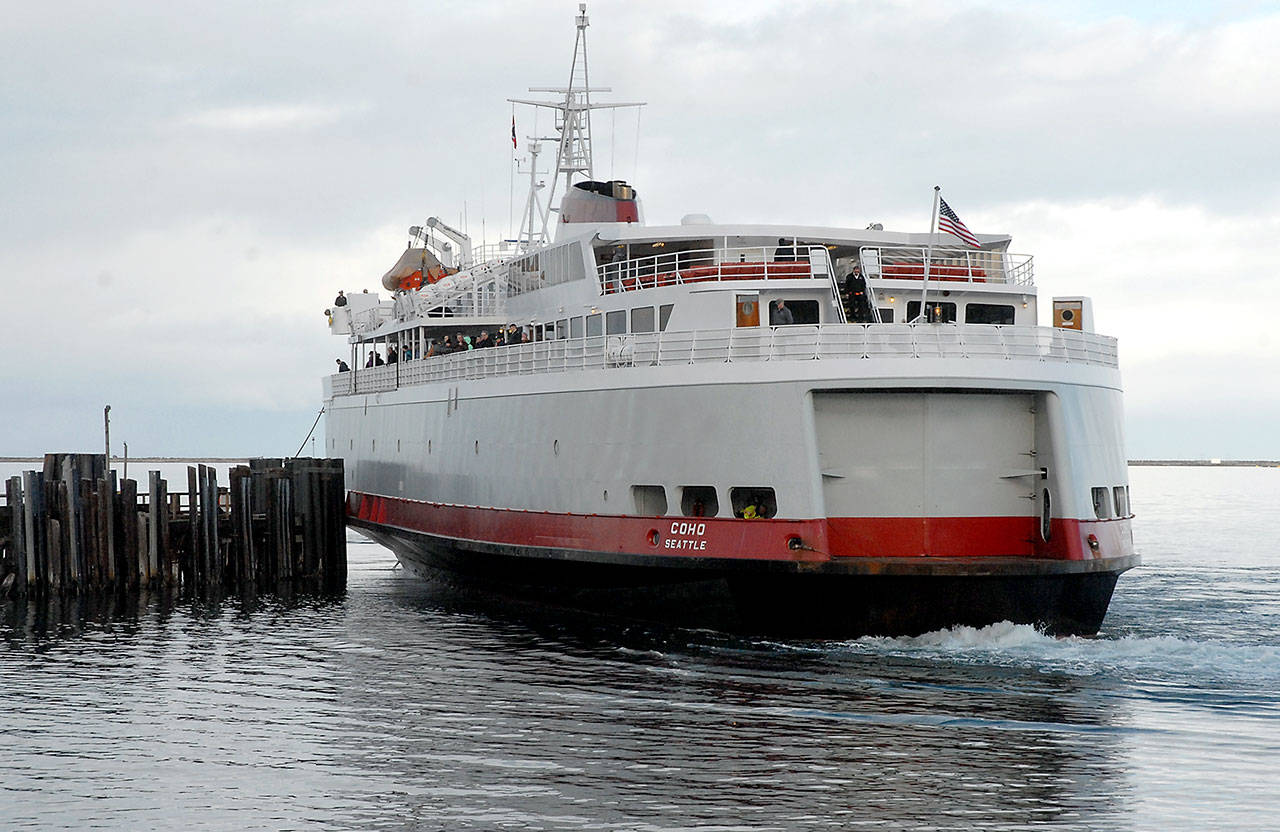 The ferry MV Coho prepares to back into its dock after arriving in Port Angeles from Victoria. (Keith Thorpe/Peninsula Daily News)