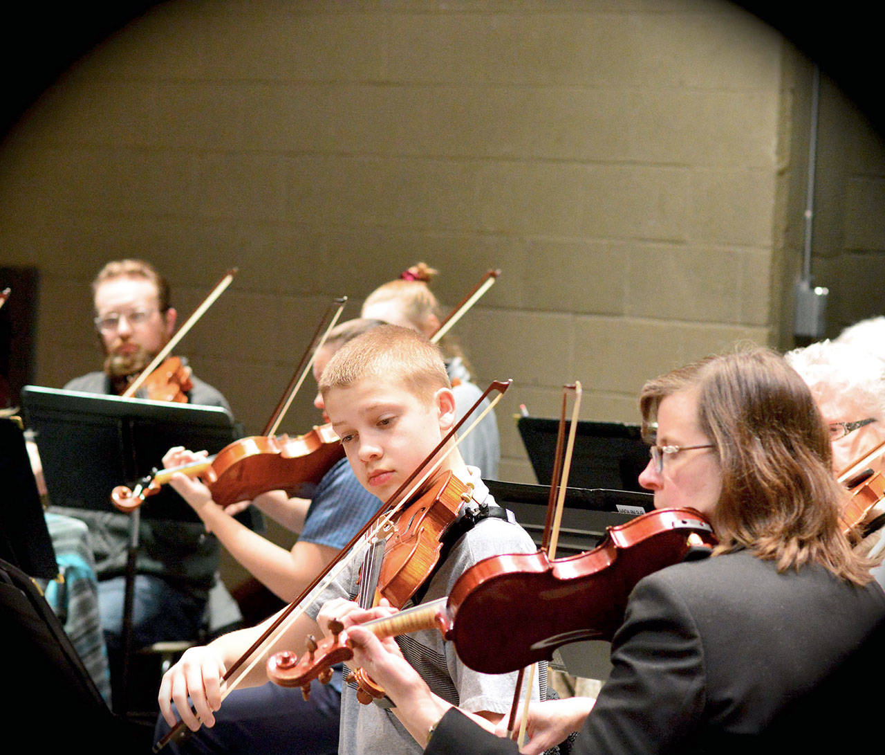 Port Angeles Symphony violinist Adam Weller, 15, is among the contestants in Saturday’s Nico Snel Young Artist Competition. The 34th annual event is open to the public at Holy Trinity Lutheran Church in Port Angeles. (Diane Urbani de la Paz/for Peninsula Daily News)