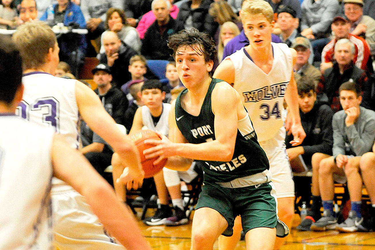 BOYS BASKETBALL: Port Angeles clamps down on Sequim in 63-32 win