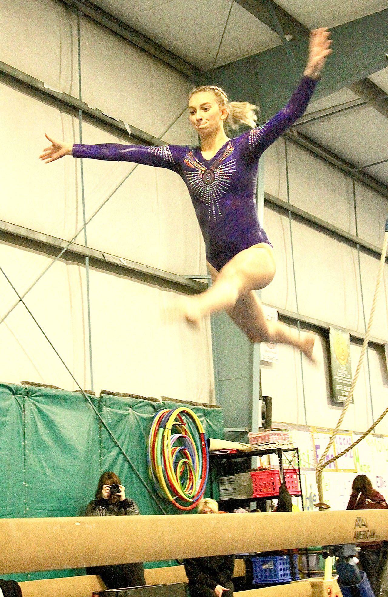 Emma Sharp of Sequim competes in the balance beam during Port Angeles’ home gymnastics meet Monday at the Klahhane Gym. (Dave Logan/for Peninsula Daily News)