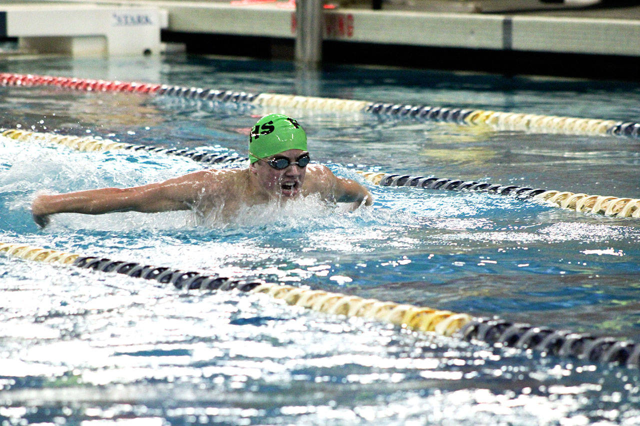 Port Angeles’ Alex Hertzog swims the 100-yard butterfly against Bremerton on Thursday.                                Patty Reifenstahl