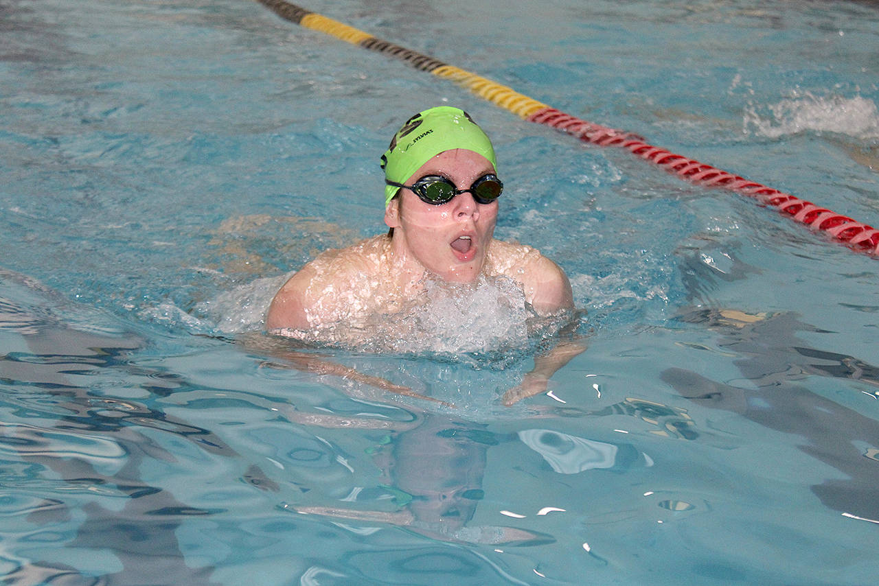 Port Angeles’ Henry Shaw swims the breast stroke leg of the 200-yard individual medley relay against Kingston. (Patty Reifenstahl)