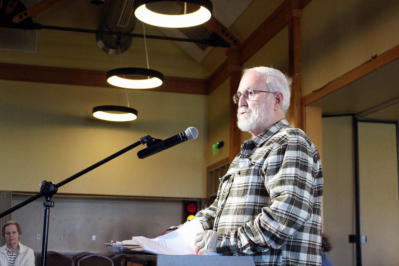Steve Rankin, range master at the Jefferson County Sportsmen Association shooting range, tells Jefferson County commissioners that he opposes banning all new outdoor shooting ranges, saying the county planning commission’s recommendation was a decision based upon politics, not safety. (Zach Jablonski/Peninsula Daily News)