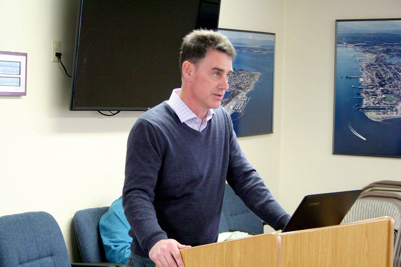 Shane Phillips of Mott MacDonald presents three alternatives to the Port of Port Townsend commissioners Wednesday, Feb. 12, 2020, during a port workshop. Phillips said construction could begin as early as winter 2021, provided all permitting can be secured by that time. (Brian McLean/Peninsula Daily News)