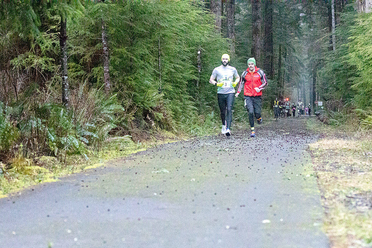 A member of Atlas Athletes from Olympia leads the pack at the second annual Frosty Moss relay race held along the Olympic Peninsula on Saturday, Feb. 29, 2020. Atlas Athletes won the 80-mile race in a time of 9 hours, 29 minutes, 15 seconds. (Matt Sagen)