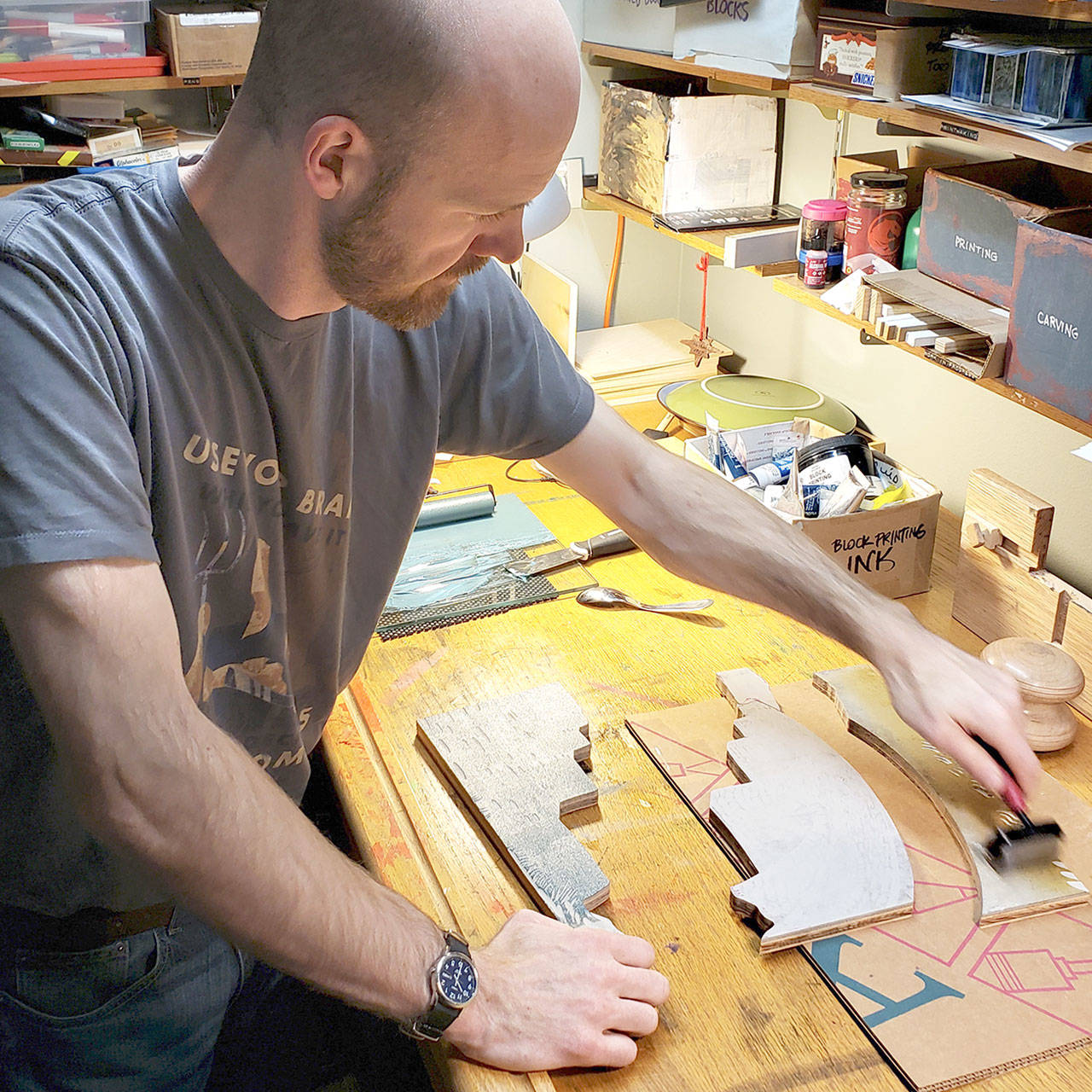 Harbor Art artist Nathan Shields works on a piece.