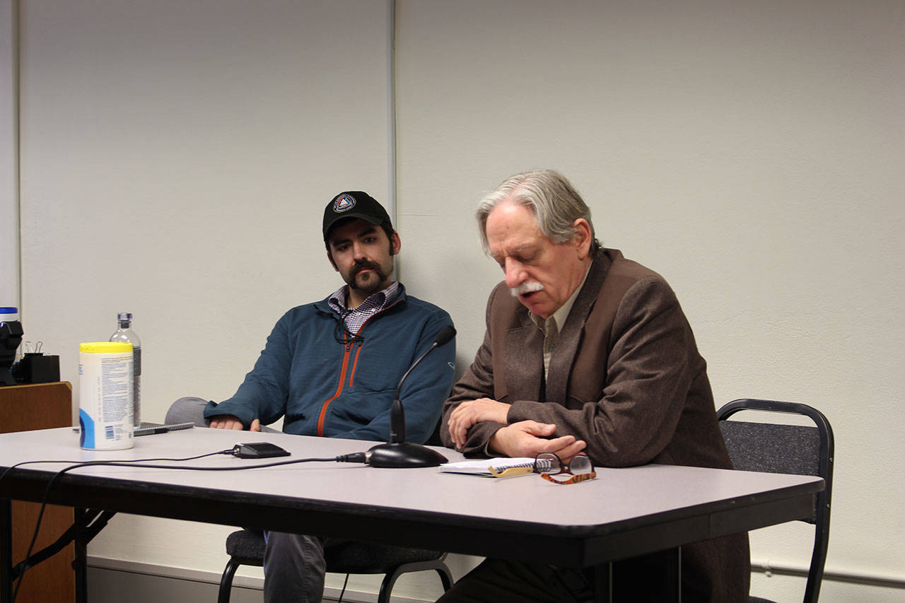 Jefferson County Emergency Management director Willie Bence, left, and Jefferson County Health Officer Dr. Tom Locke brief the county commissioners on the status of COVID-19 in Jefferson County at the commissioners’s meeting Monday morning, March 16. (Zach Jablonski/Peninsula Daily News)