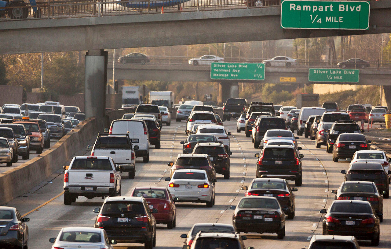 This Dec. 12, 2018, file photo shows traffic on the Hollywood Freeway in Los Angeles. President Donald Trump’s is expected to mark a win in his two-year fight to gut one of the United States’ single-biggest efforts against climate change, relaxing ambitious Obama-era vehicle mileage standards and raising the ceiling on damaging fossil fuel emissions for years to come. (Damian Dovarganes/Associated Press file)