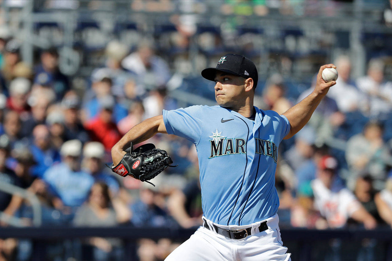 Seattle Mariners’ Marco Gonzales throws during a spring training baseball game against the Chicago Cubs on Monday, Feb. 24, 2020, in Peoria, Ariz. (Darron Cummings/The Associated Press)