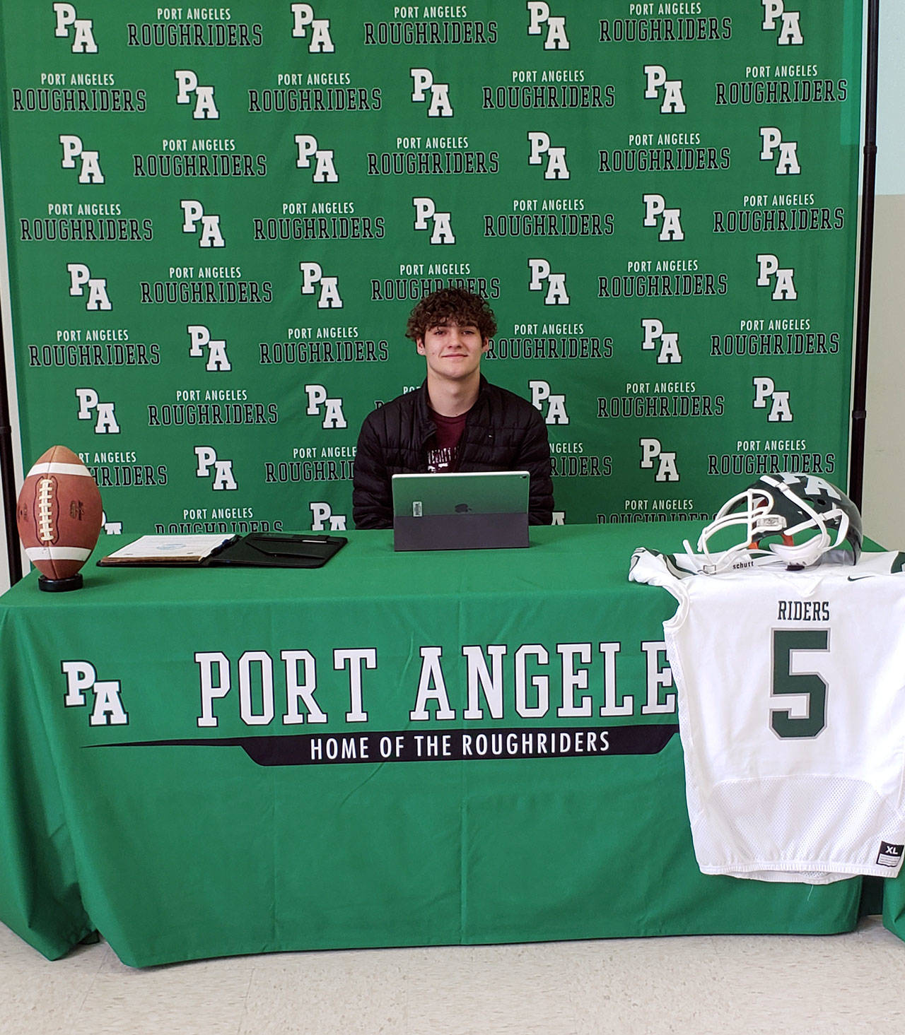 Port Angeles senior Tyler Bowen recently signed a letter of intent to play football at the University of Puget Sound. Bowen’s virtual signing day, likely the first of its kind on the North Olympic Peninsula, was remotely attended by more than 30 family members, friends, coaches and teachers.