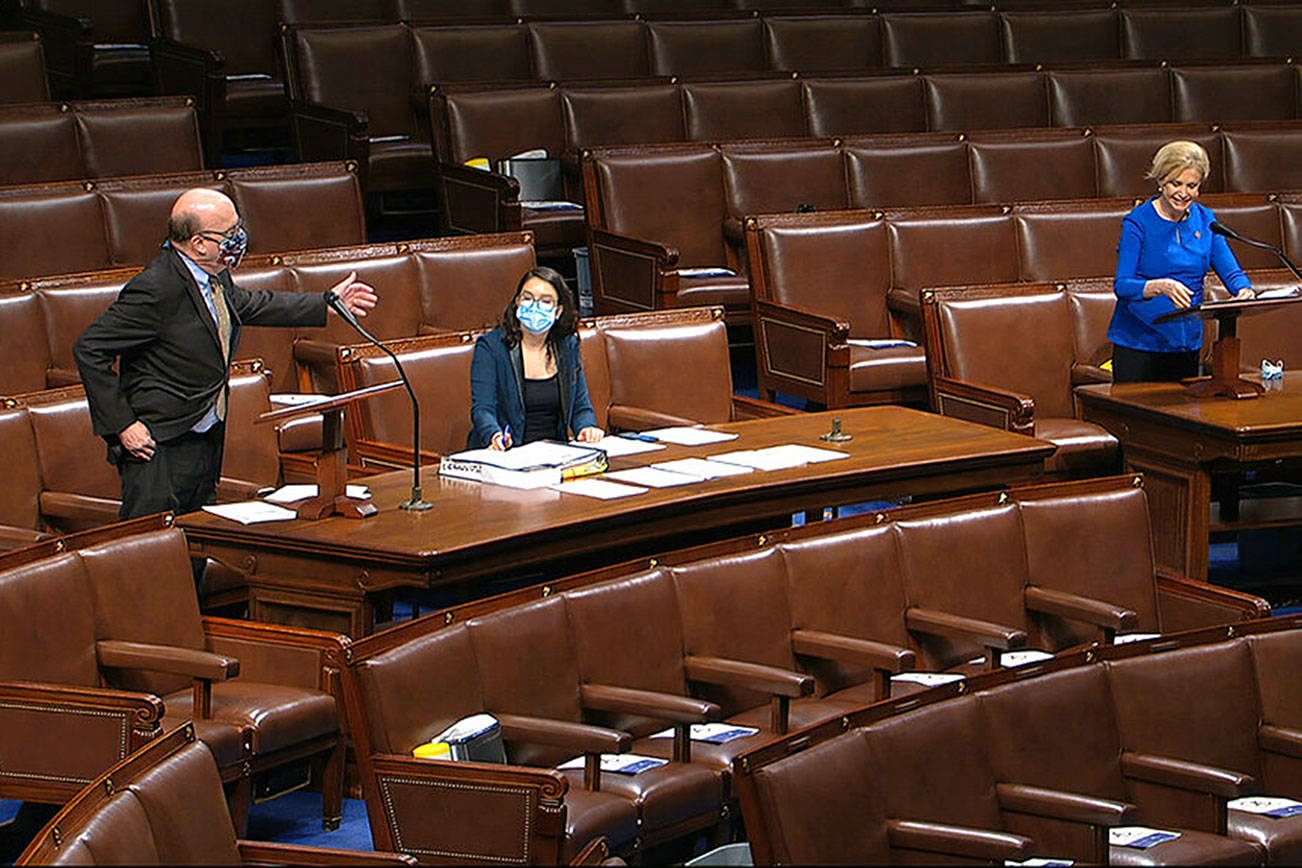 Somber Congress delivers nearly $500B more in virus aid