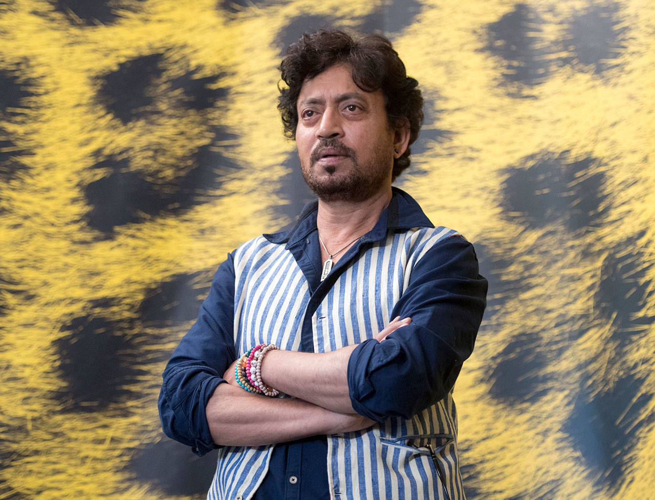 This Aug. 9, 2017, file photo shows Indian actor Irrfan Khan posing during the photocall for the film “The Song of Scorpions” at the 70th Locarno International Film Festival in Locarno, Switzerland. Khan, a veteran character actor in Bollywood movies and one of India’s best-known exports to Hollywood, died Wednesday, April 29, 2020, after being admitted to Mumbai’s Kokilaben Dhirubhai Ambani hospital with a colon infection. He was 54. (Urs Flueeler/Keystone via AP, File)