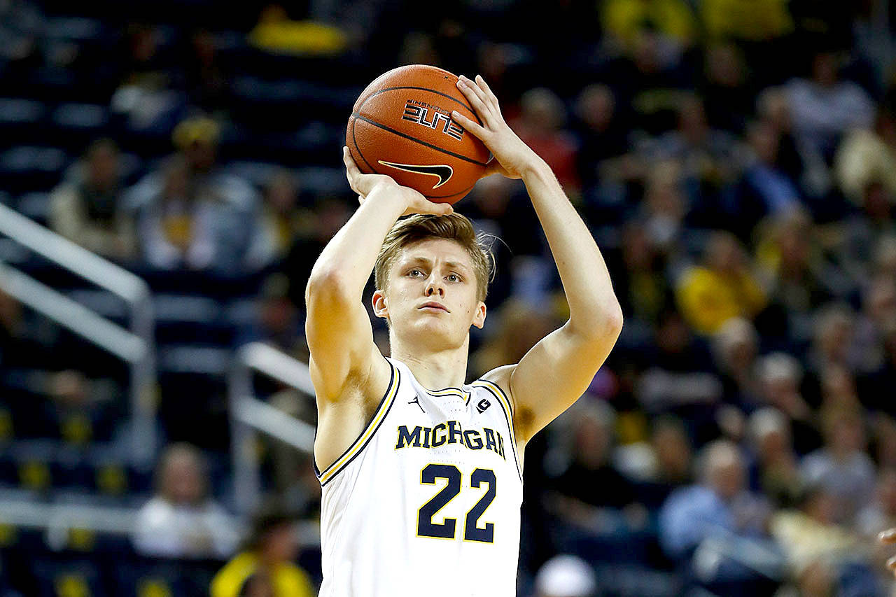 Michigan guard Cole Bajema, a Lynden Christian graduate, shoots against Saginaw Valley State on Nov. 1, 2019. Bajema has transferred to the University of Washington. (Paul Sancya/Associated Press file)