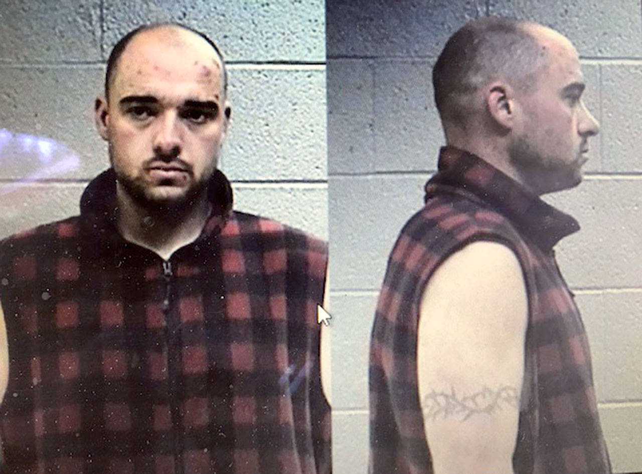 Michael Brandon Gross was arrested Friday morning after eluding law enforcement officers Thursday when he swam across the Sol Duc River.