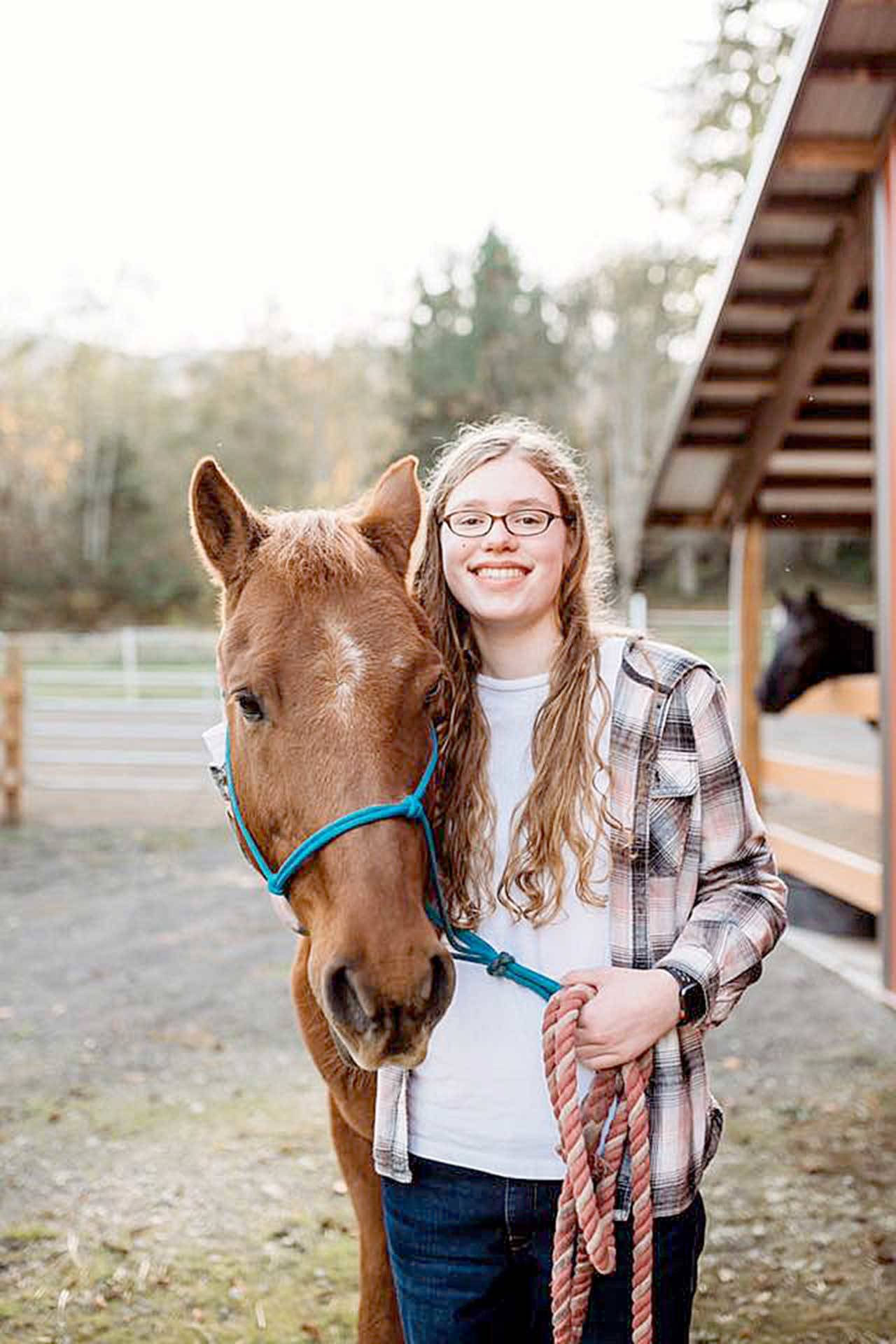 Emma Weller and her mustang-Arabian cross, Mikey.
