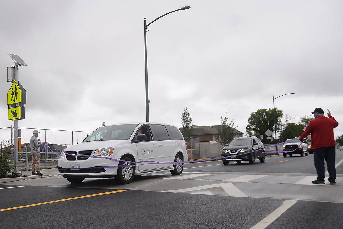 Sequim caps street rehab project with wheeled ribbon-cutting