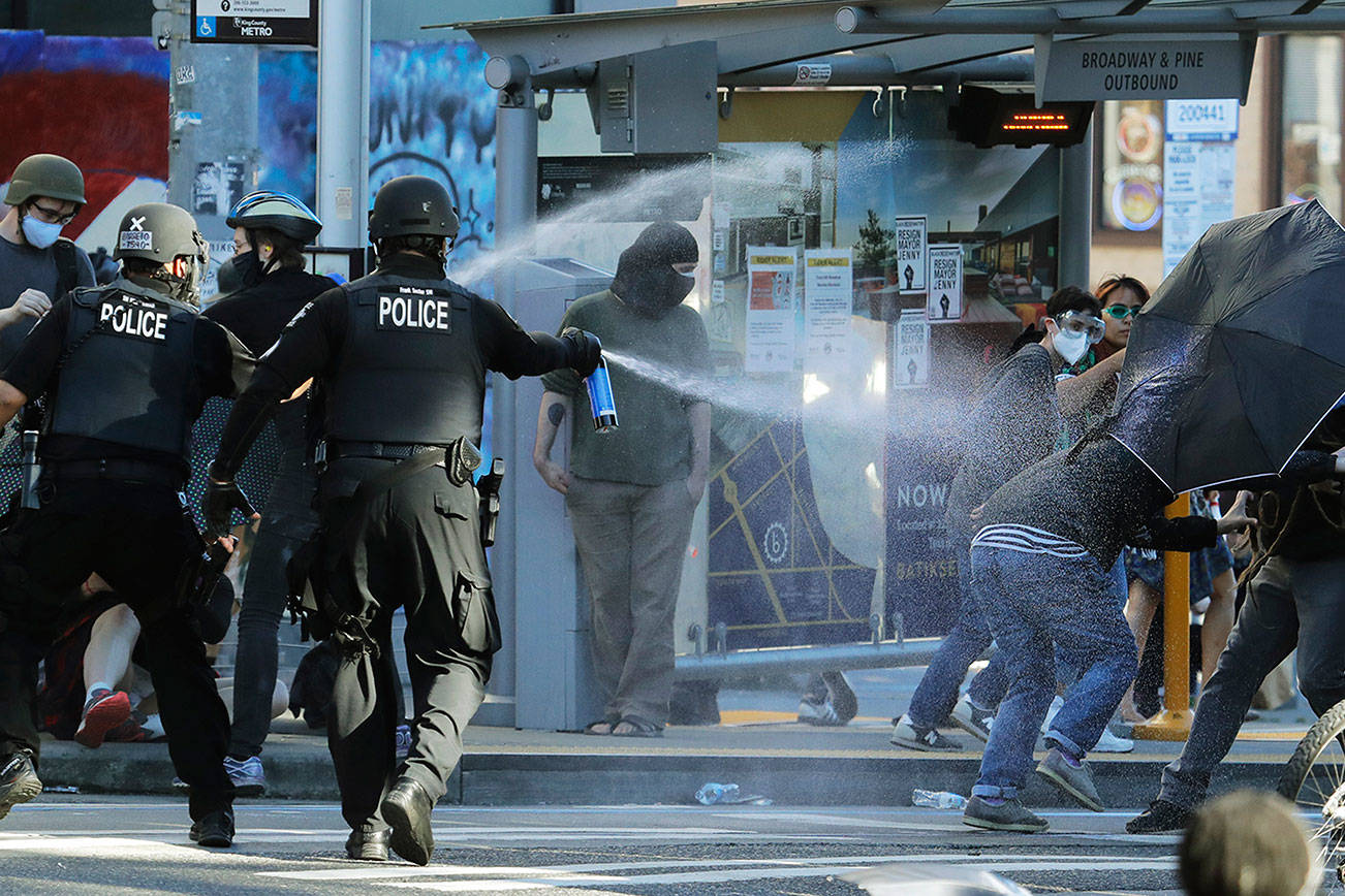 Activists want Seattle police held in contempt