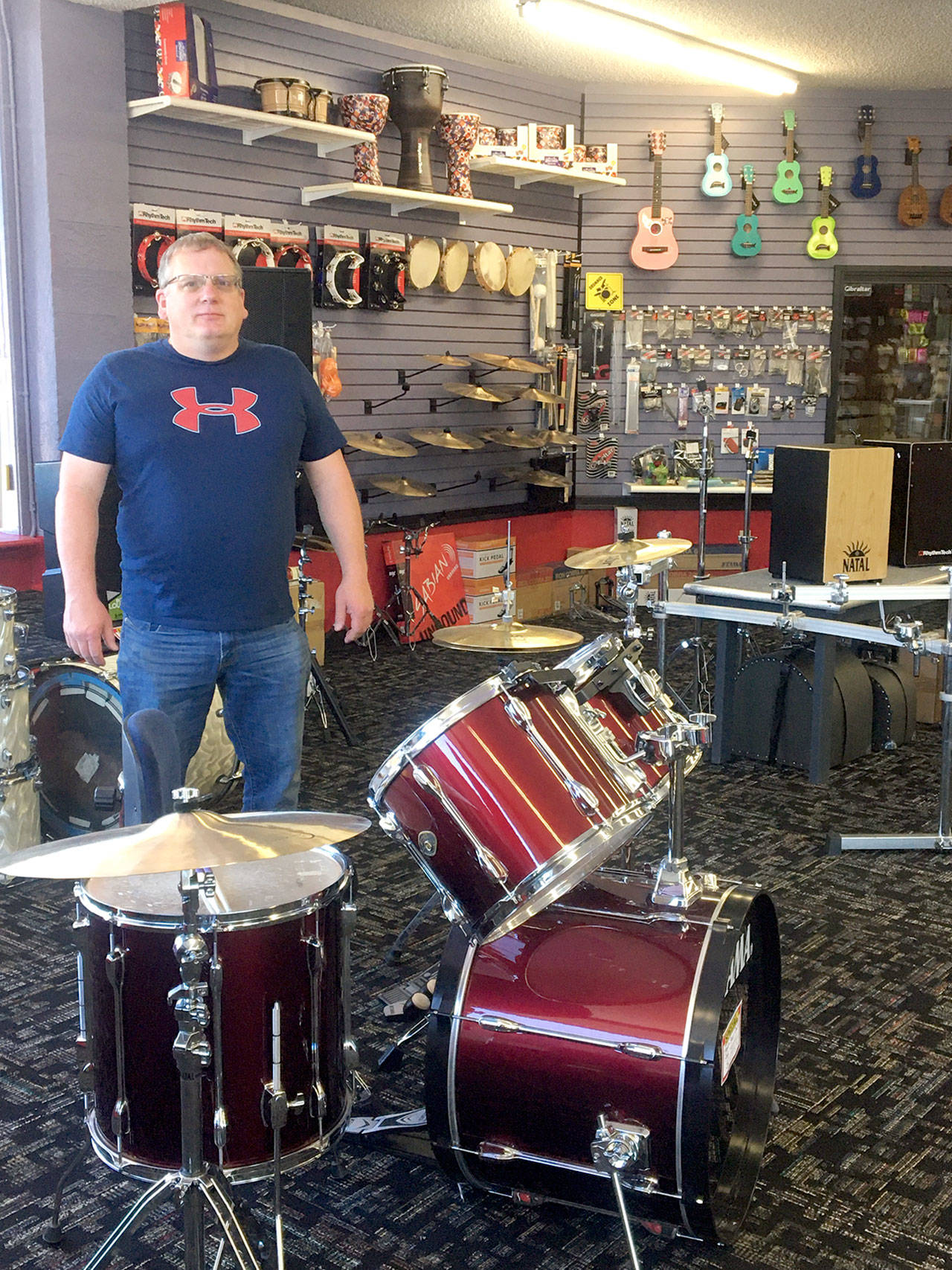 John Frichette, owner of Peninsula Music. (Vivian Hansen/Peninsula Daily News)